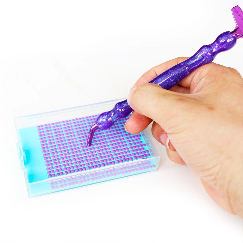 Threaded diamond painting pen in use with diamond tray