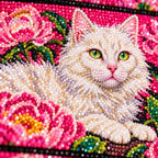 Close-up of diamond drills in the three cat portraits—a white cat, orange tabby, and black cat—among pink peonies design.