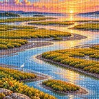 Close-up of sparkling drills on the tidal marsh water and golden grasses