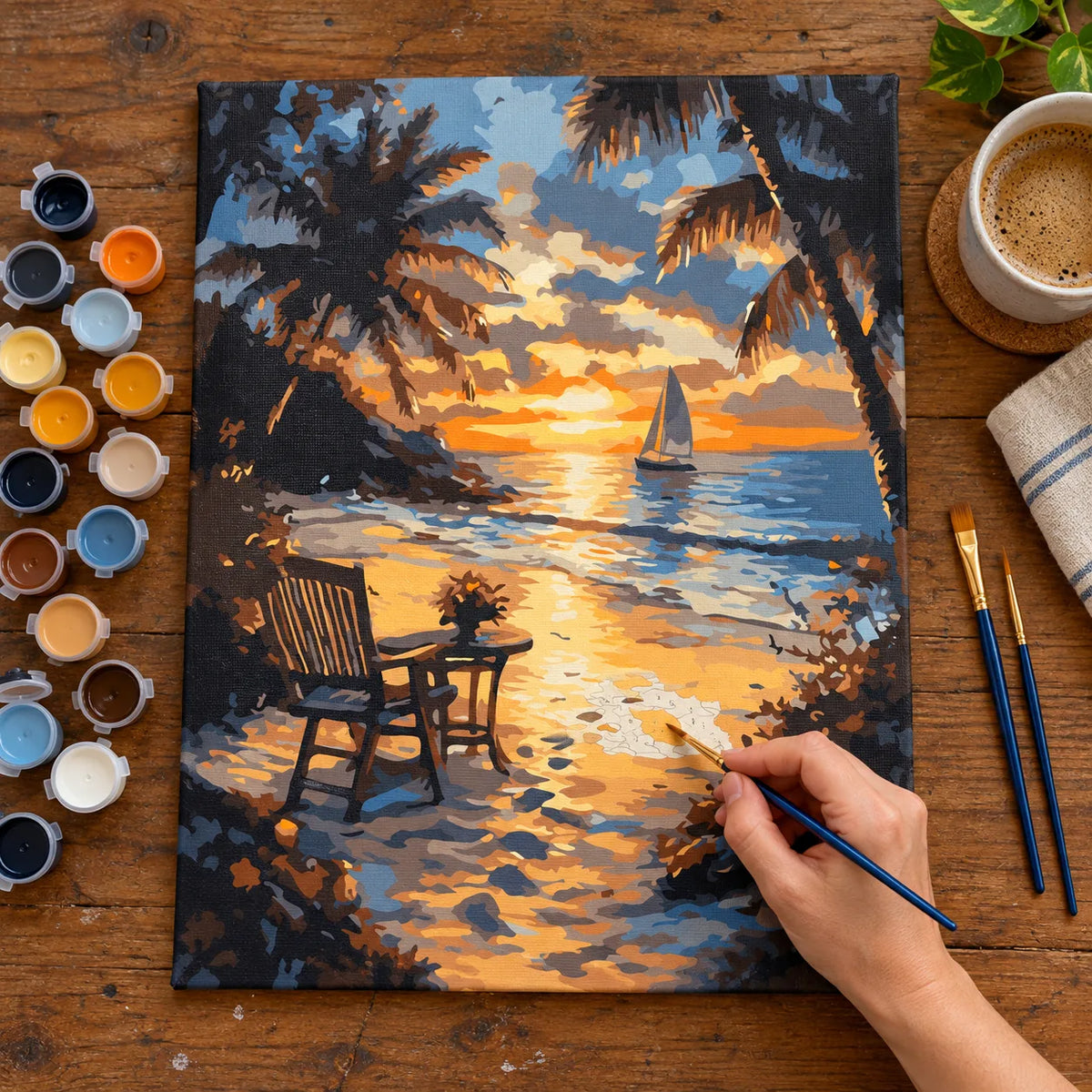 Complete Tropical Sunset Sailboat numbered canvas being painted with acrylic paints and brushes