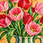 Pink tulips arranged in a green striped pitcher: close-up of diamond drills
