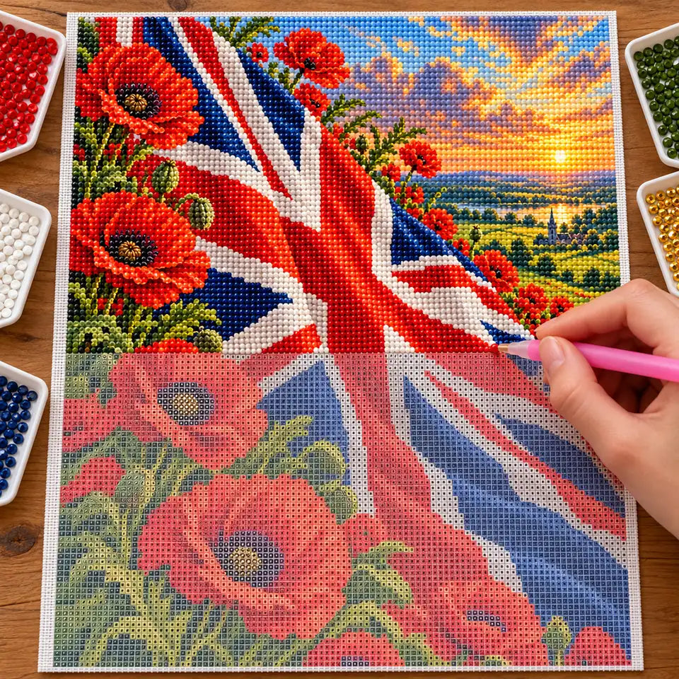Hand placing diamond drills on the Union Jack poppies canvas beside trays of drills