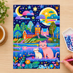 Diamond painting process showing the moonlit village cats design being completed with a stylus