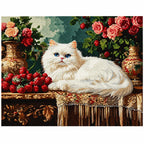 Finished diamond painting of a white cat resting beside roses on an antique table.
