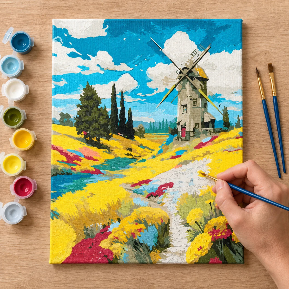 Complete Windmill in Wildflower Field numbered canvas being painted with acrylic paints and brushes