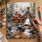 Complete Winter Log Cabin by Stream numbered canvas being painted with acrylic paints and brushes