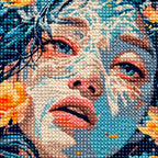 Close-up of diamond drills on artwork showing a woman’s portrait surrounded by golden and blue flowers.