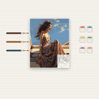 Complete Woman in Flowing Dress by the Sea numbered canvas being painted with acrylic paints and brushes