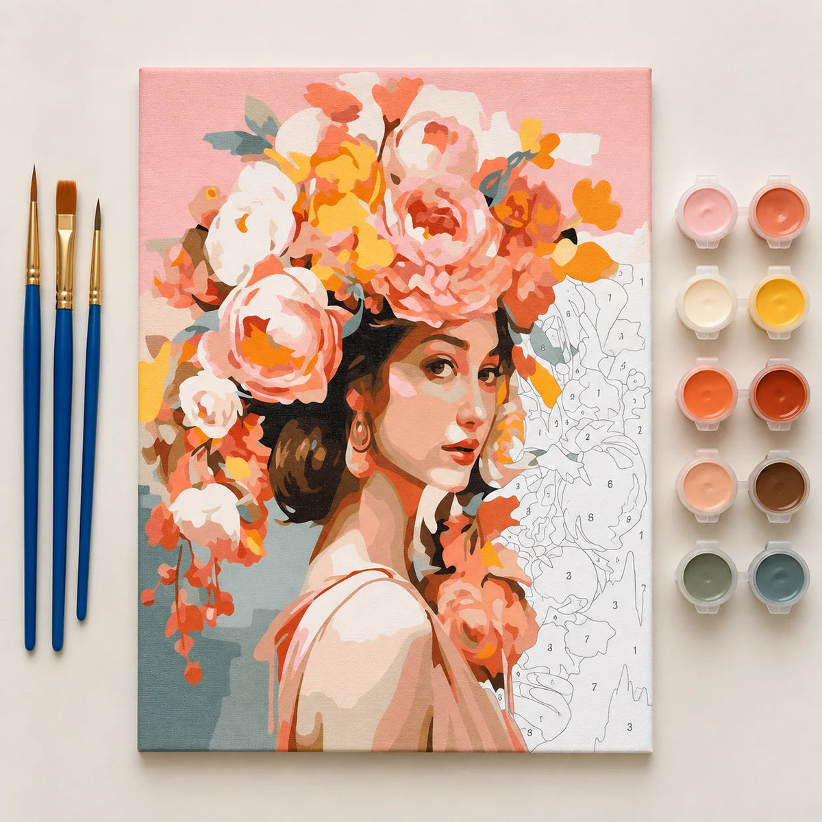 Complete Woman with Peach Flower Crown numbered canvas being painted with acrylic paints and brushes