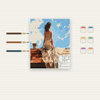 Complete Woman in White Dress on Rooftop numbered canvas being painted with acrylic paints and brushes