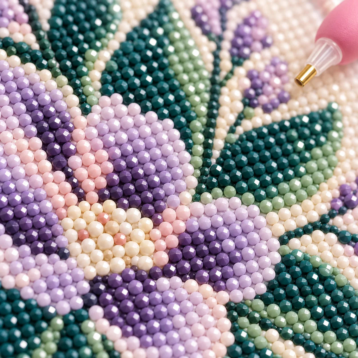 Macro view of uniform faceted resin diamonds in aligned rows